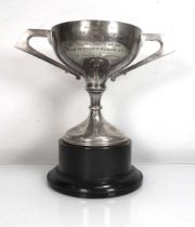 An early 20th century silver two handled trophy vase of Art Deco design, makers mark indistinct,