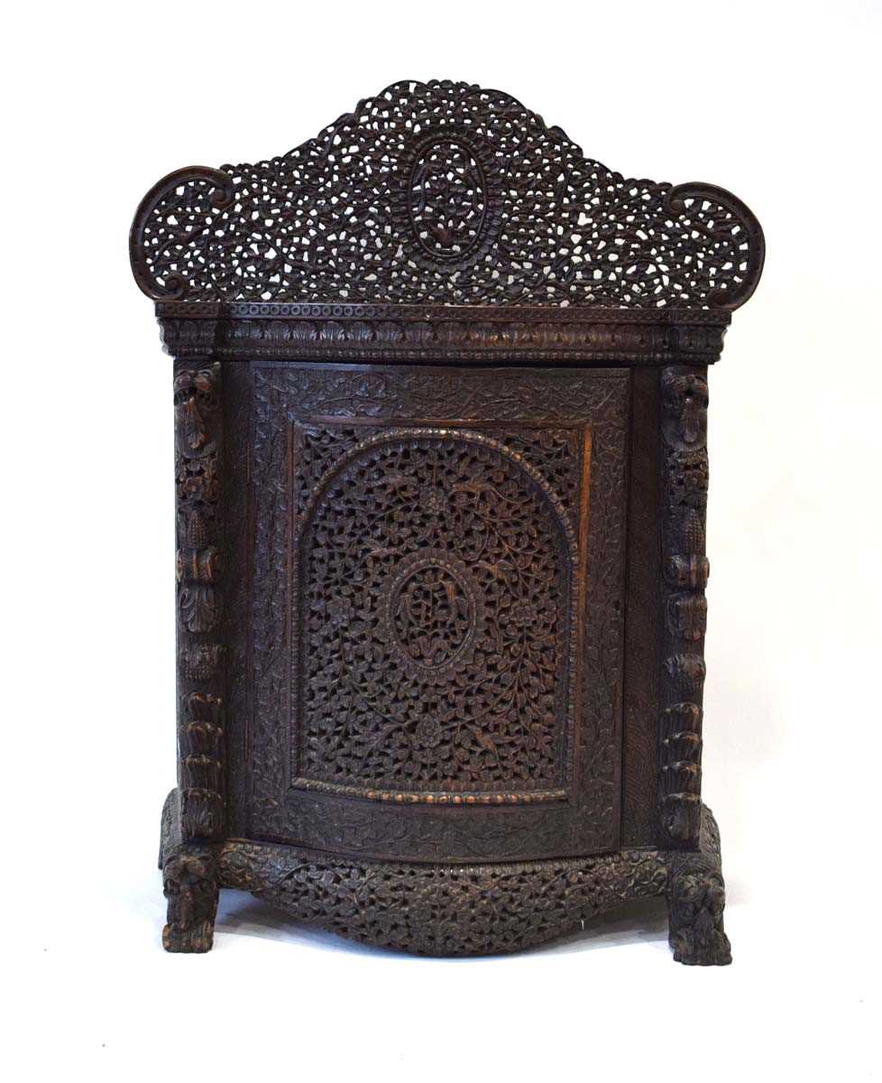 A 19th century Anglo-Indian (?)padouk side cabinet, the intricately carved back over a bow-front and - Image 3 of 4