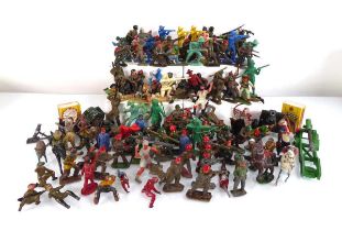 A group of cart metal and plastic figures including Lone Star cowboys and Indians, military models