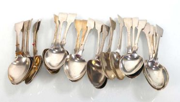 Twenty-two William IV and later silver fiddle pattern dessert spoons, various dates and makers,