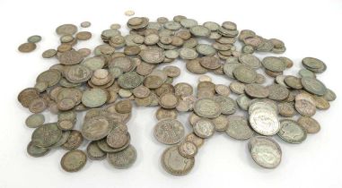 A group of British part silver coinage including half crowns, shillings, six pences etc., overall