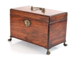 A George III mahogany box, the interior with three compartments, on brass ball and claw feet, 25 x