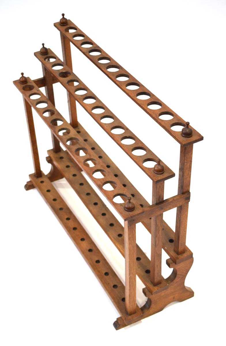 An early 20th century oak three-tier stick stand, w. 74 cm, h. 60 cm - Image 2 of 2