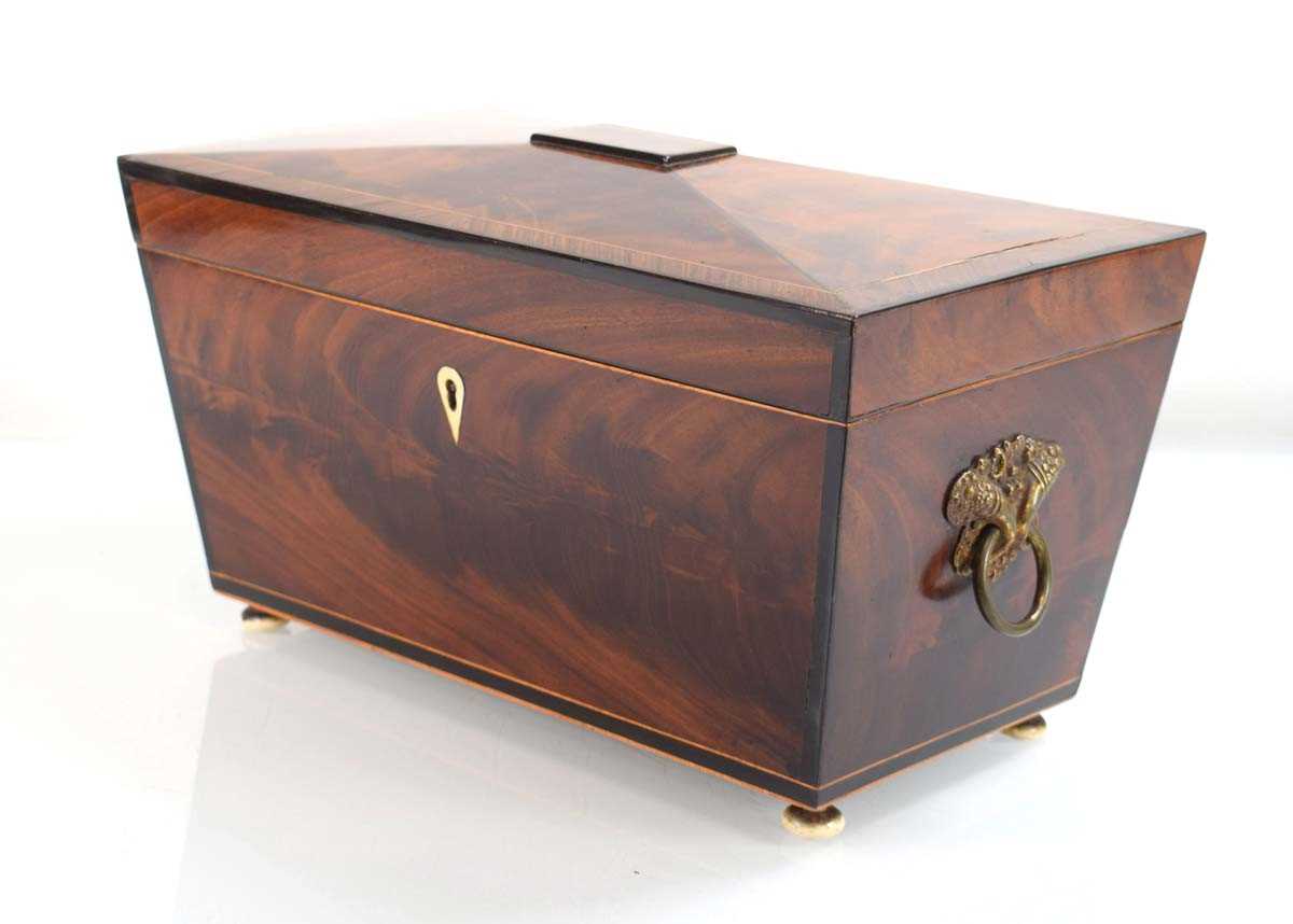 A 19th century mahogany and satinwood strung tea caddy of sarcophagus form, the interior of the - Image 2 of 2