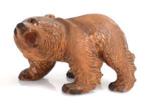 A Chinese carved figure of a bear in the Black Forest manner, w. 30 cm