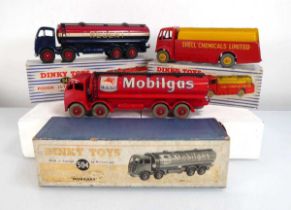 Three Dinky commercial models: 504 Foden 14 ton tanker, 942 Foden 14 ton tanker and 991 AEC