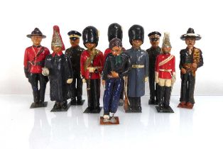 Ten Philip B Ducker 'Toydell' moulded and painted (?)plaster figures modelled as guardsmen, military