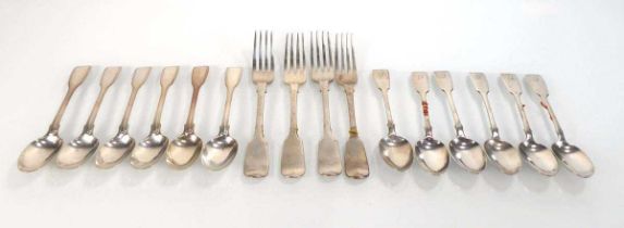 A mixed group of silver comprising four fiddle pattern dessert forks, six fiddle pattern