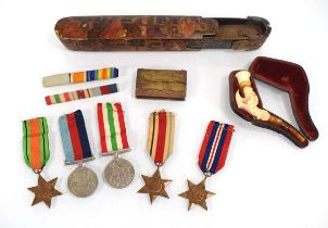 A group of Second World War medals including Defence, War, 1939-1945 Star, Italy Star and Africa