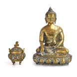 A brass figure modelled as Shakyamuni Buddha, h. 38 cm, together with a brass and enamelled