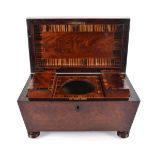 A 19th century mahogany and rosewood banded tea caddy, the interior with two detachable