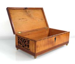 A 19th century satinwood, walnut and crossbanded box with fretwork sides and brass ball feet, 37 x