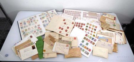 A collection of stamps contained in two albums, on envelopes and loose, including an extensive group