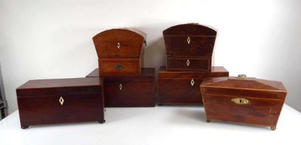 A group of six 19th century boxes including two similar dome-topped work boxes, three tea caddies