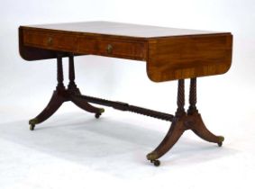 A Regency mahogany and tulipwood crossbanded sofa table inlaid with boxwood and ebonised lines,