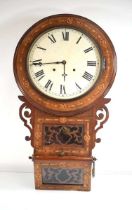 A late 19th century wall clock, the circular face within a marquetry and fretwork case