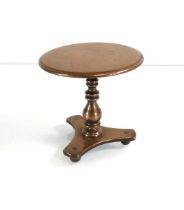 A miniature brass table, di. 10.5 cm, h. 10.5 cm