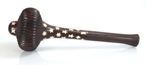 A Fijian i-ula tavatava throwing club, the body inlaid with bone stars and motifs, the handle richly