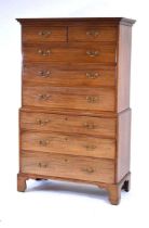 A George III mahogany chest-on-chest with an arrangement of two short over six long drawers, with