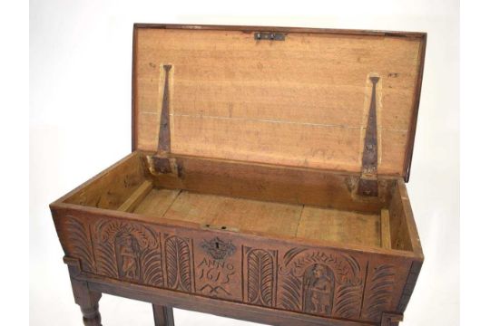 An oak box on stand, the interior of sloped form, the front panel with decorative carving and - Image 4 of 8