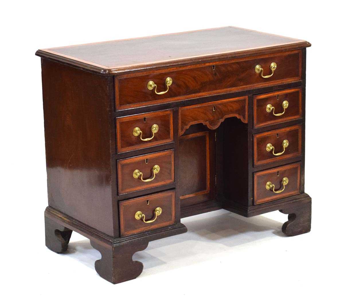 A George III mahogany, satinwood banded and ebony strung kneehole desk with an arrangement of one - Image 2 of 8