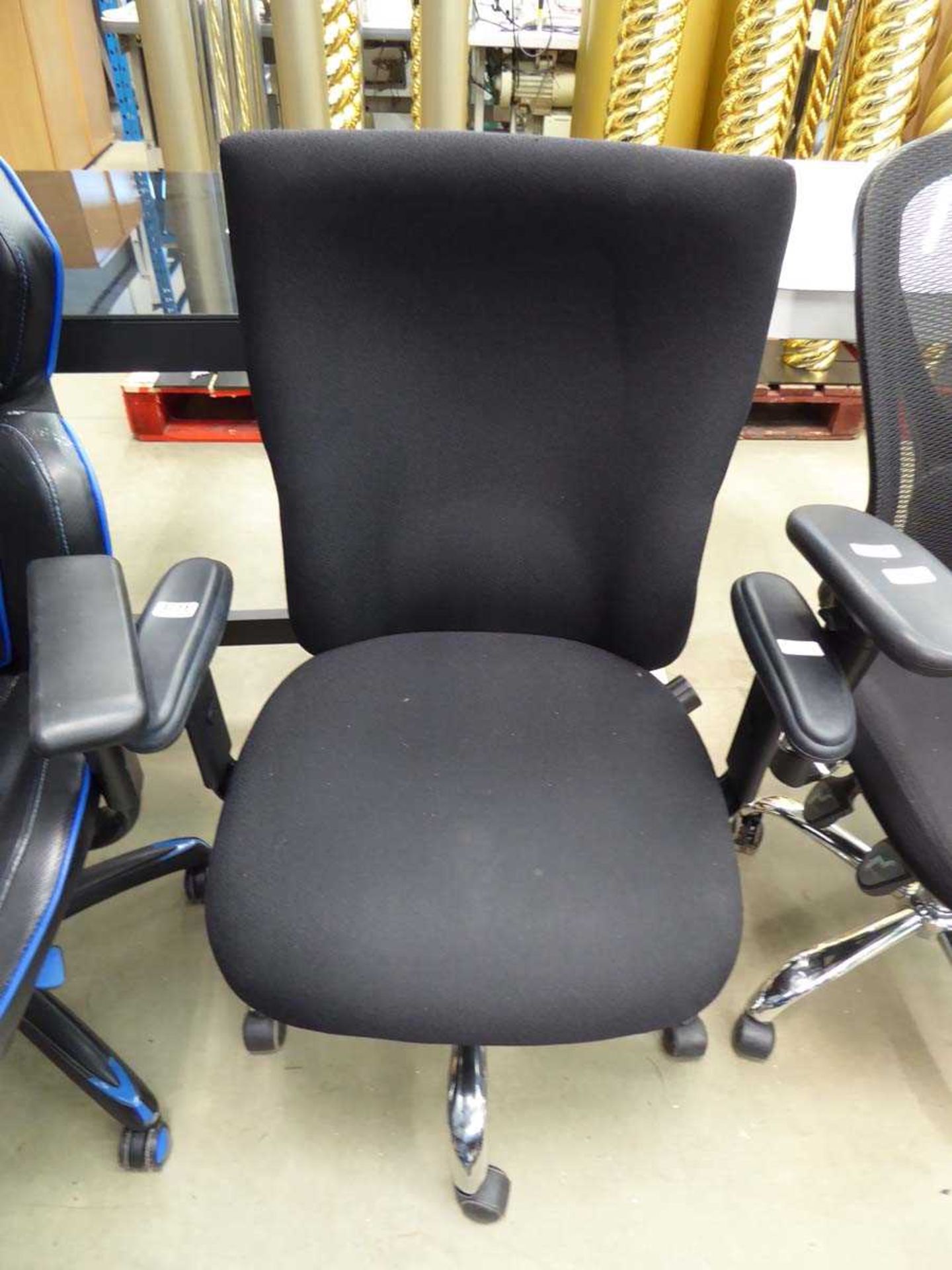 Black cloth swivel armchair