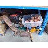 Half an underbay containing garden pots, garden tools, bench, small roller etc.