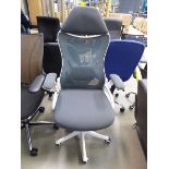 +VAT Grey cloth mesh backed white frame swivel armchair