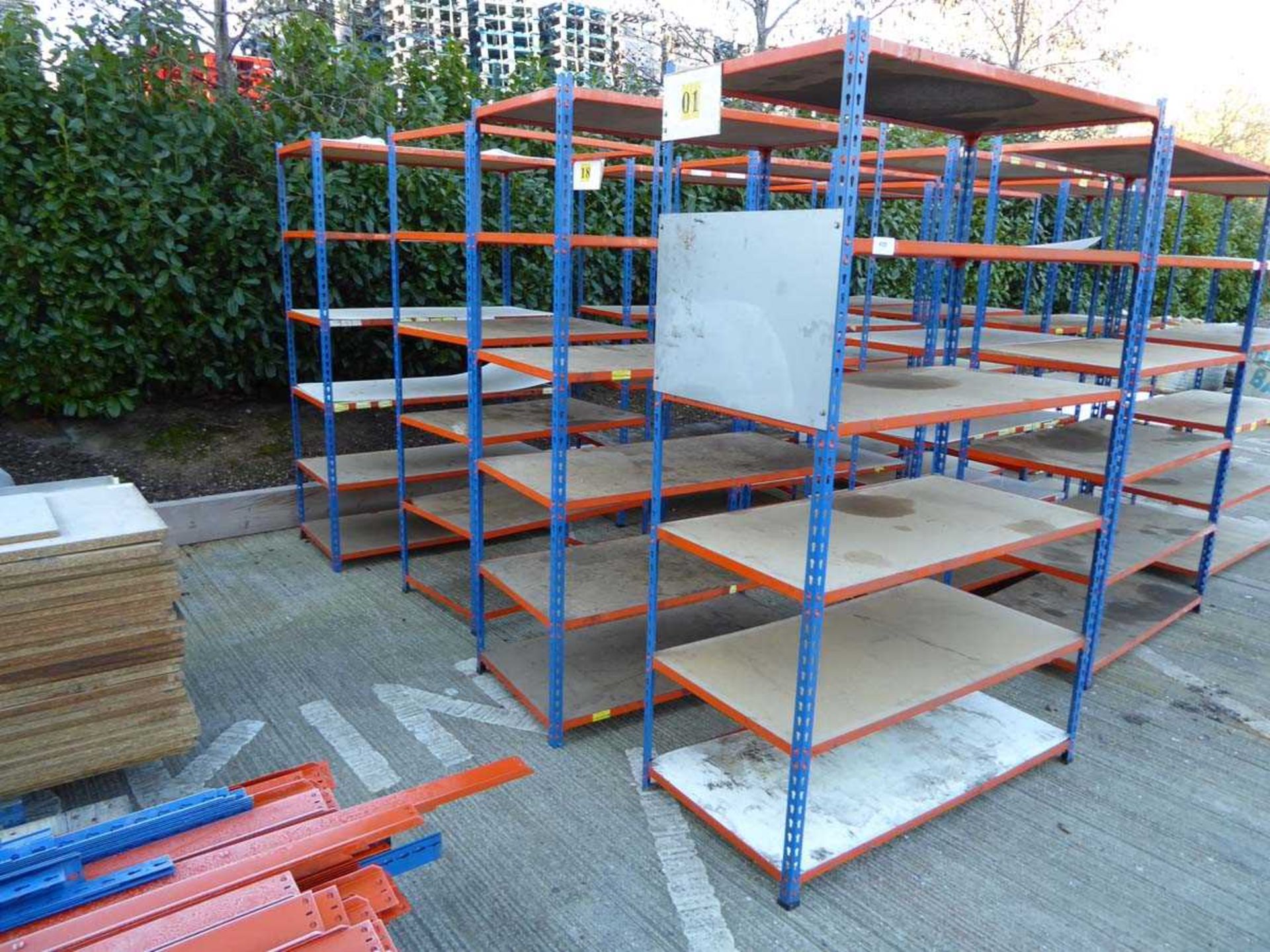 +VAT Four blue and orange metal racks