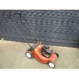 Red petrol powered rotary mower, no grass box