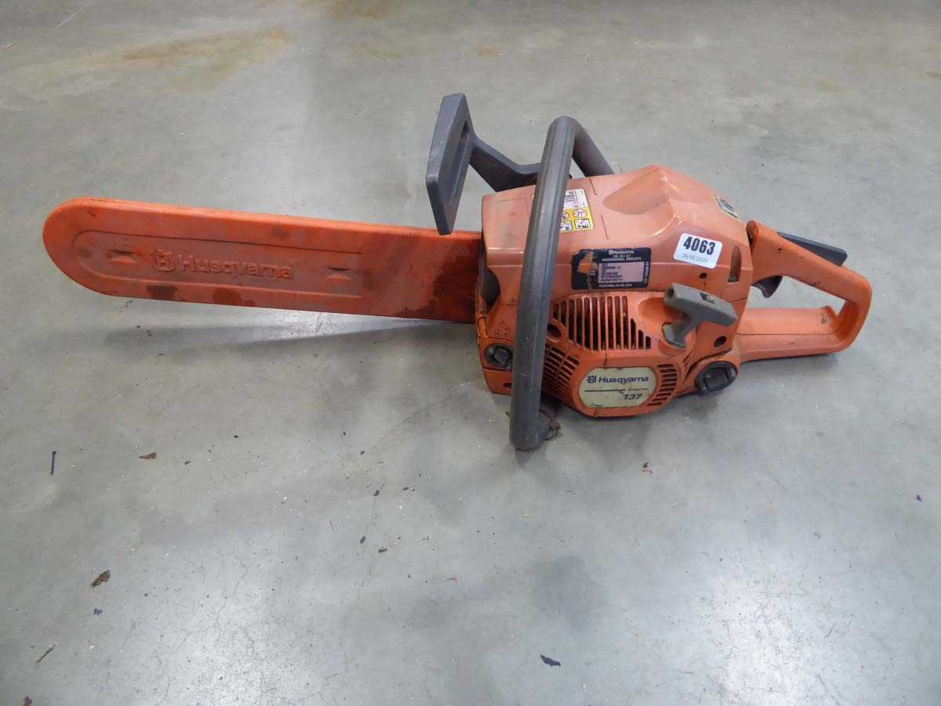 Husqvarna 137 petrol powered chainsaw