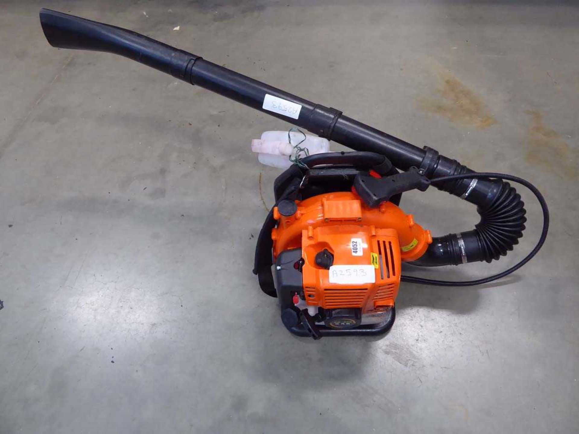 Orange petrol powered leaf blower