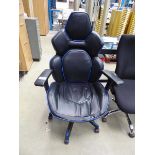 +VAT Blue and black gaming chair with ripped seat