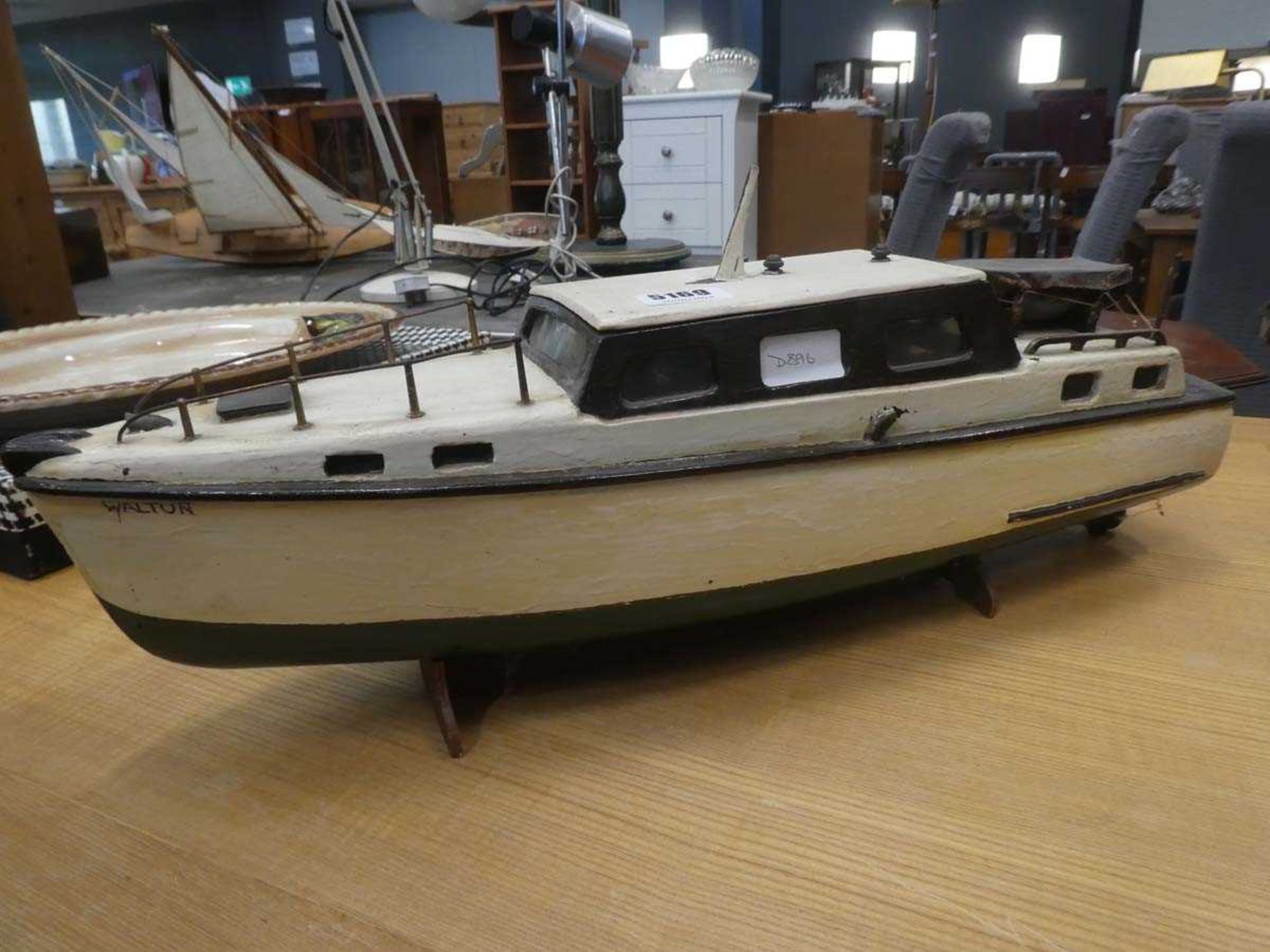 Model boat on stand