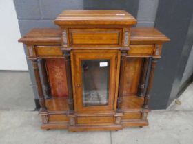 Small walnut cabinet with single glazed door