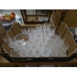 Box containing tumblers, wine glasses, and fruit bowl