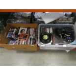 2 boxes containing DVDs, CDs, tape cassettes and vinyl records