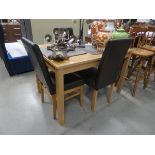 Oak dining table plus three leather effect chairs