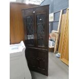 Modern oak corner unit with glazed and leaded doors