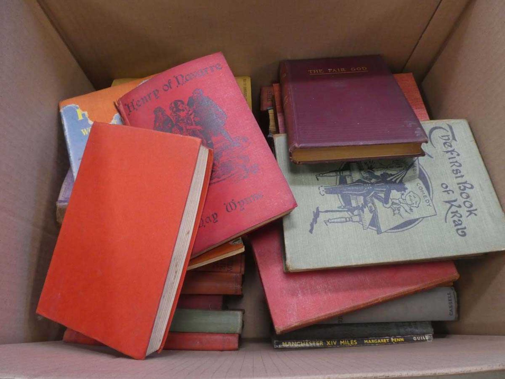 Box containing Agatha Christie and other novels