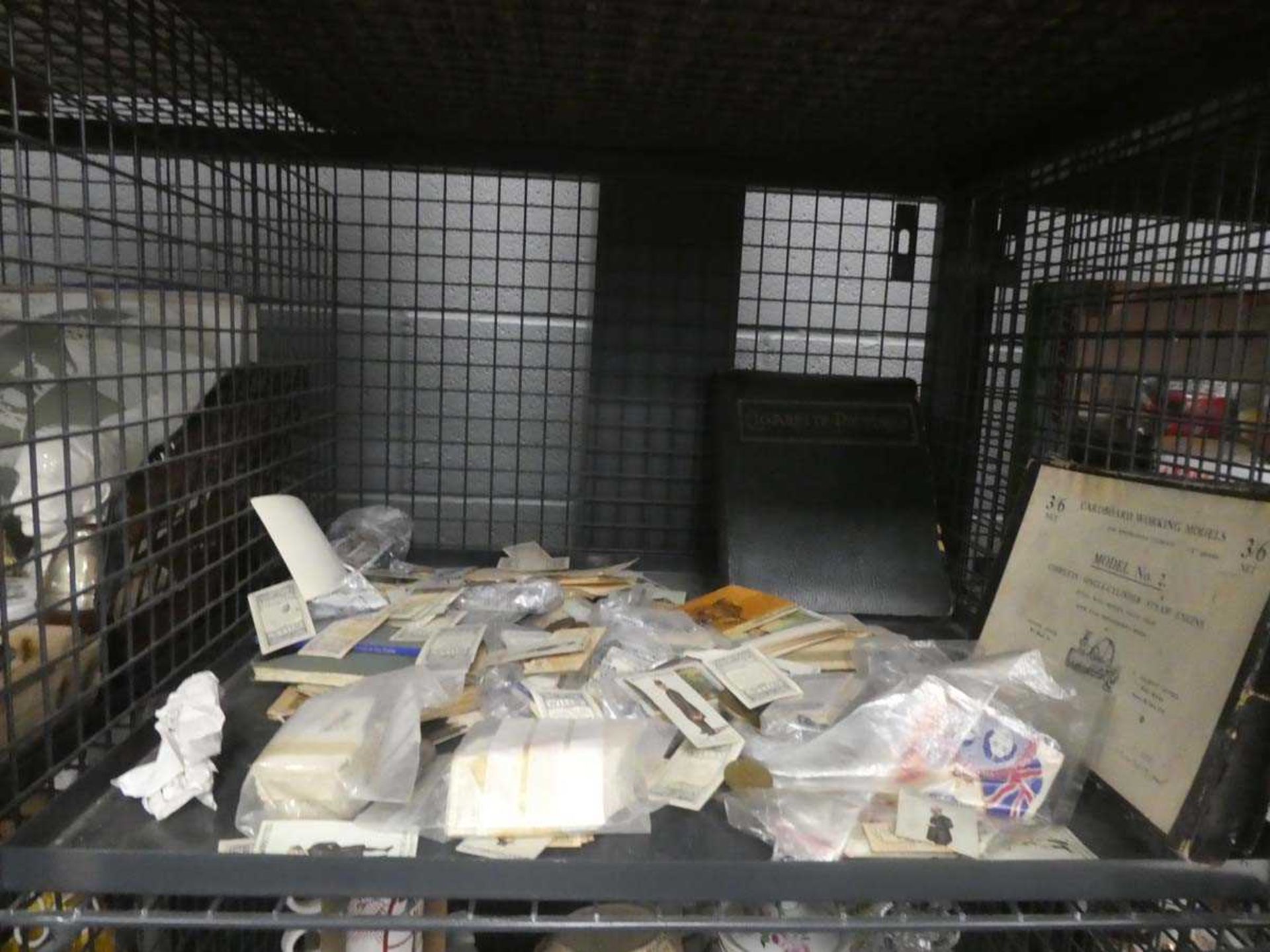 Cage containing collection of cigarette and tea cards plus album