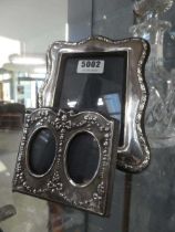 Two silver photo frames