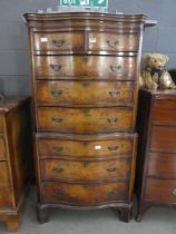 Serpentine fronted walnut chest on chest