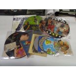 Selection of 7" and 12" picture discs including New Order, Thompson Twins etc.