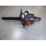 Hitachi orange petrol powered chainsaw