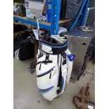 White and blue golf bag with single club
