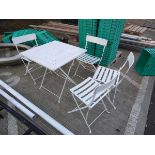 Square garden table ad 4 fold up chairs