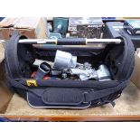 Tool bag containing nut runner, spray gun and small tools