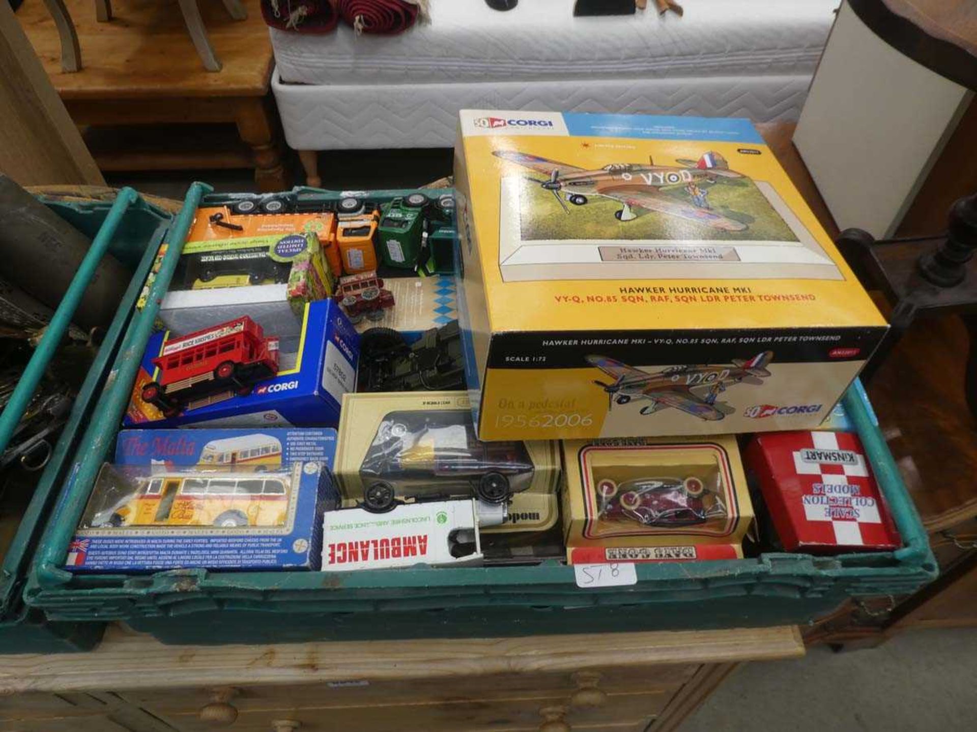 Box containing Corgi and other die cast cars