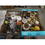 2 boxes containing lady and wade figures, modern horse brasses, carved Balinese ornaments plus toast